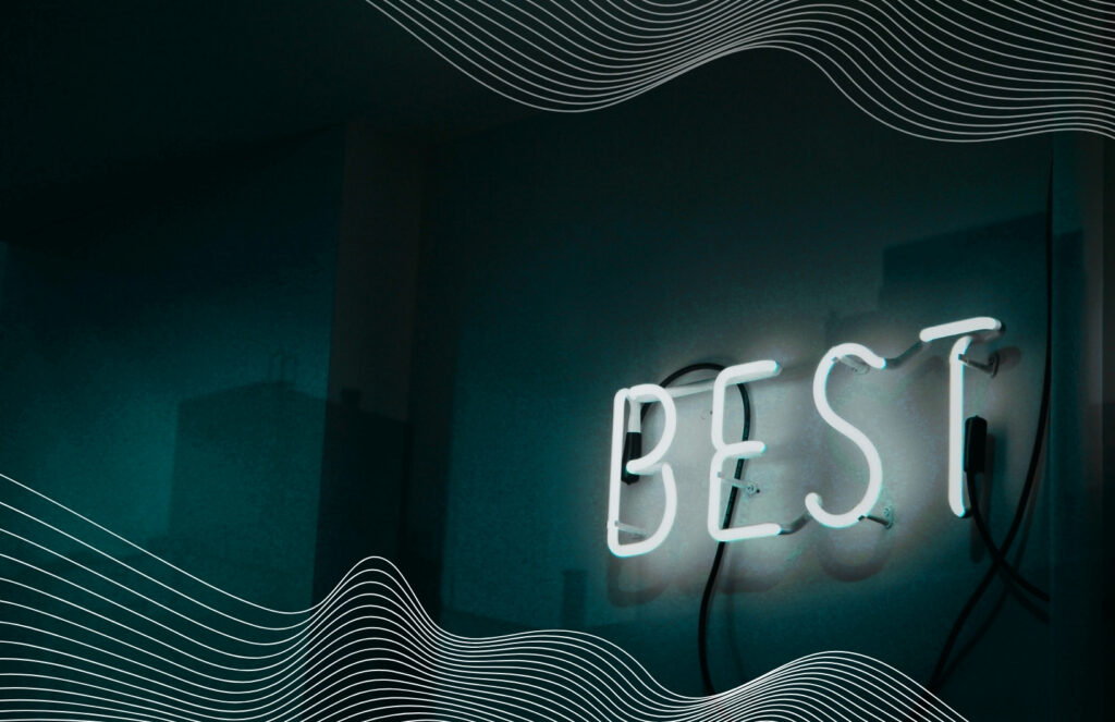 Neon sign reading “BEST” glows on a dark wall with wavy white graphic lines in the foreground.