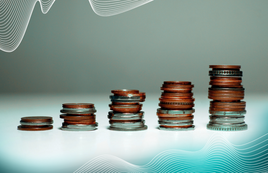 Five stacks of assorted coins arranged from shortest to tallest against a gray background with wavy white lines.
